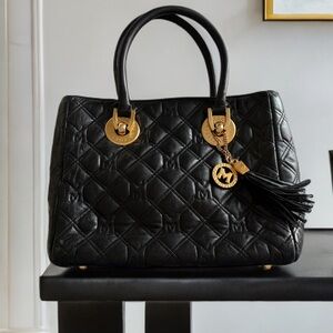 Authentic MetroCity quilted handbag